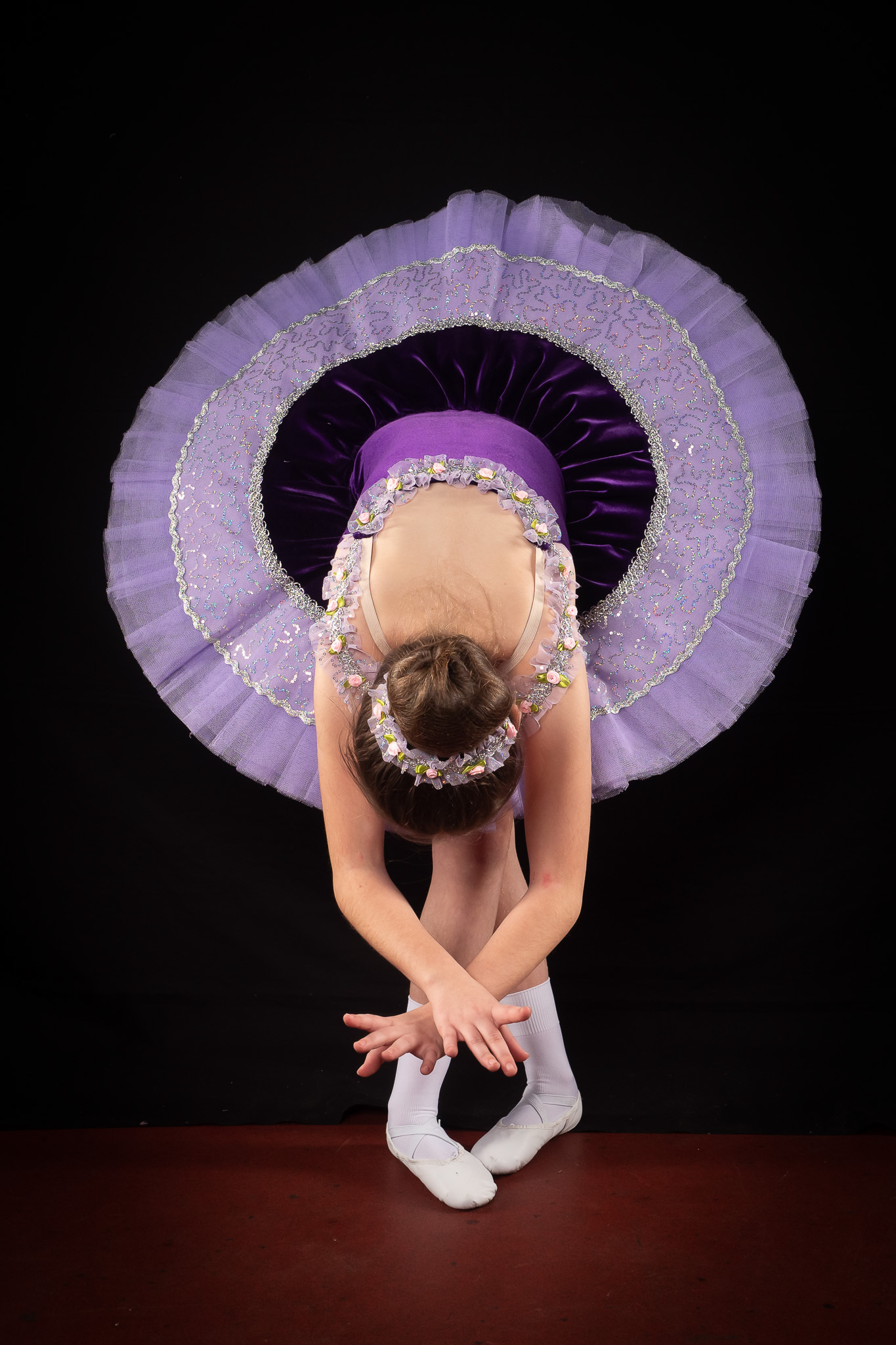 Stand out in the dance world with a stunning portfolio by Helen Rose Photography. Elevate your image and showcase your skills.