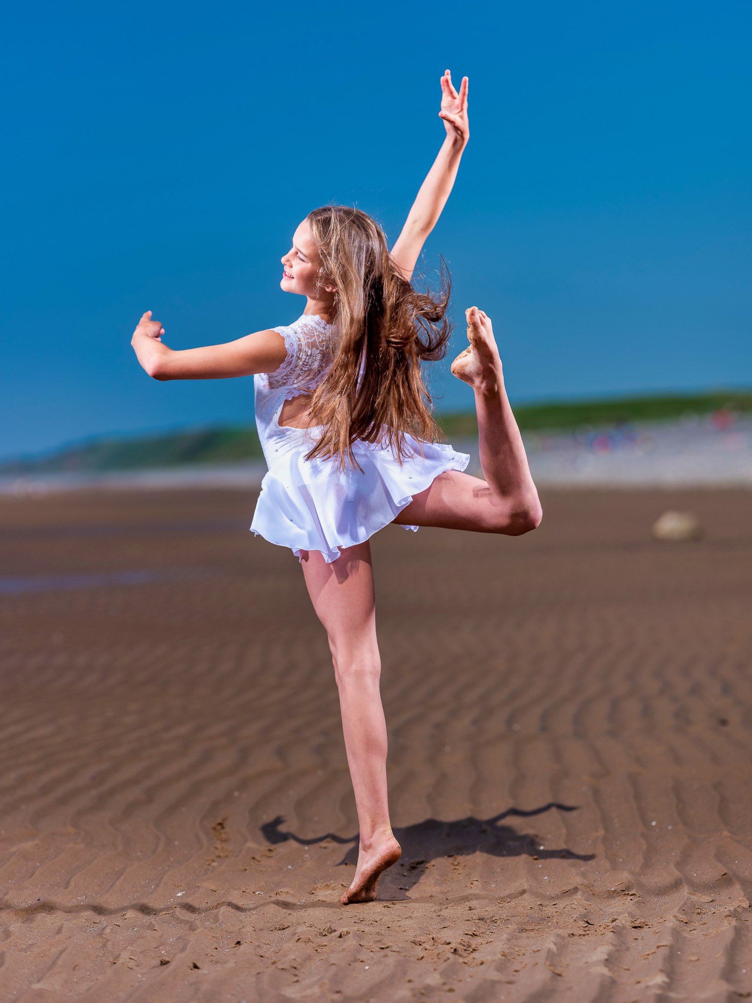 Stand out in the dance world with a stunning portfolio by Helen Rose Photography. Elevate your image and showcase your skills.